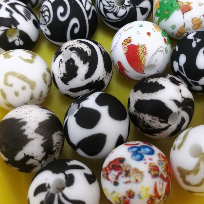 Por atacado o silicone impresso feito sob encomenda de 12mm perla grânulos maiorias em borracha de Teether do silicone da cópia do leopardo para o bebê de DIY que sai os dentes o brinquedo