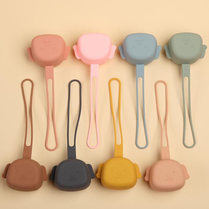 Anel saindo os dentes do silicone novo do bebê da forma do cão do produto comestível 2021 com suporte da chupeta