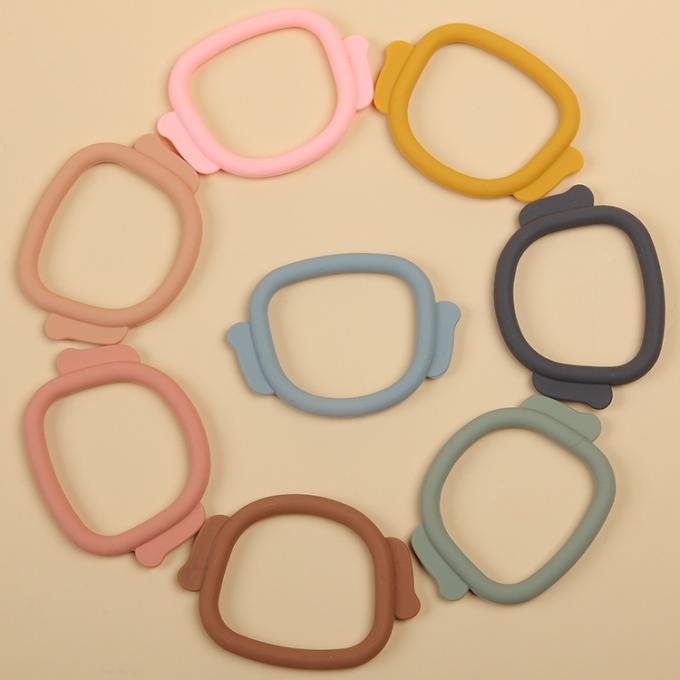 Anel saindo os dentes do silicone novo do bebê da forma do cão do produto comestível 2021 com suporte da chupeta