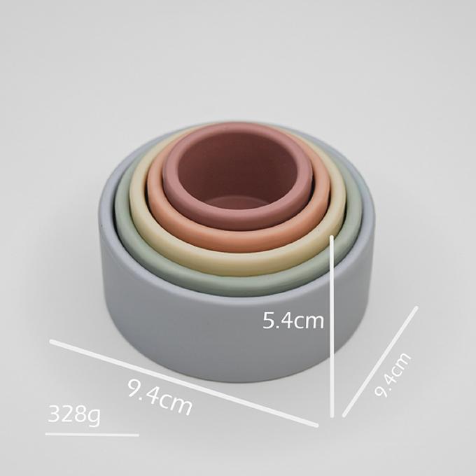 O silicone novo da chegada de TOREEL 2021 empilha acima brinquedos do copo para o jogo do auto do bebê e o desenvolvimento do cérebro