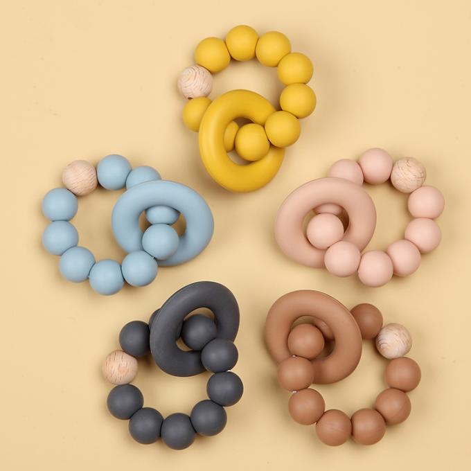 Brinquedo orgânico de borracha natural por atacado de Teether do bebê do silicone infantil com um anel