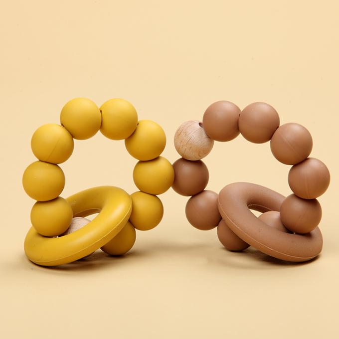 Brinquedo orgânico de borracha natural por atacado de Teether do bebê do silicone infantil com um anel