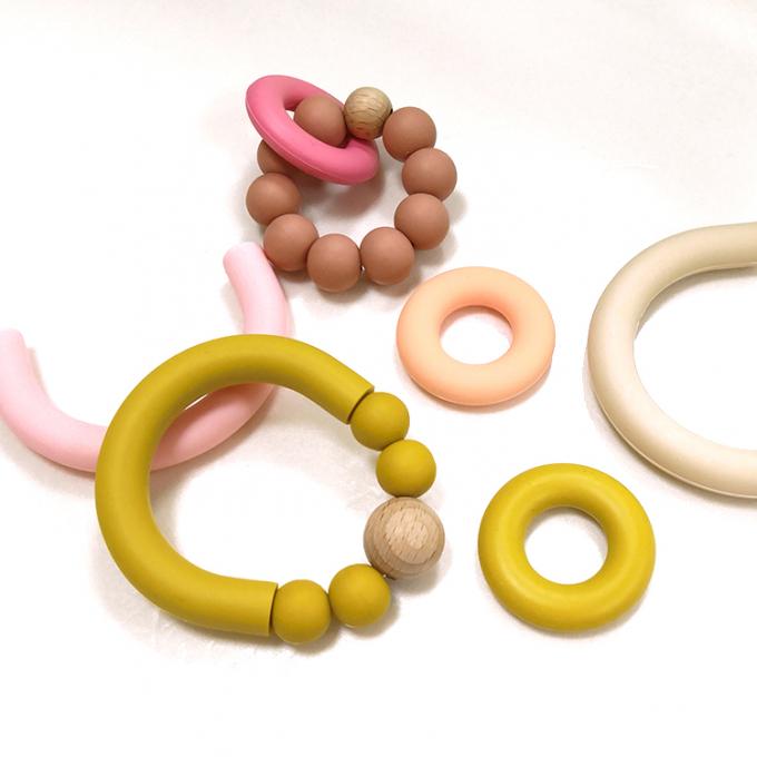 Bebê livre do silicone de Wholesald BPA que mastiga o anel saindo os dentes com anel do silicone