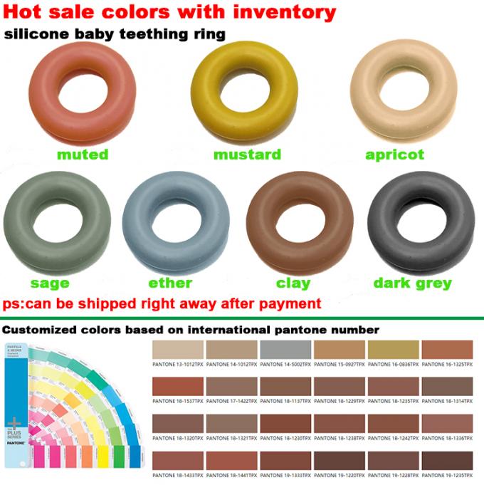 Anel saindo os dentes do silicone por atacado de Teether do bebê da forma da filhós da categoria do comida para bebê