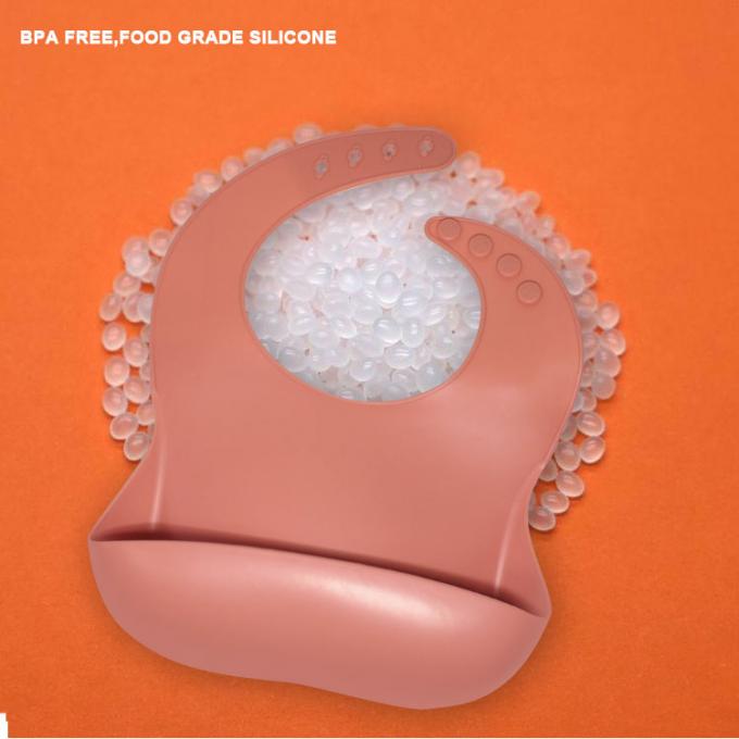 Os babadores impermeáveis por atacado do bebê do silicone com rolam acima para crianças dos infantes