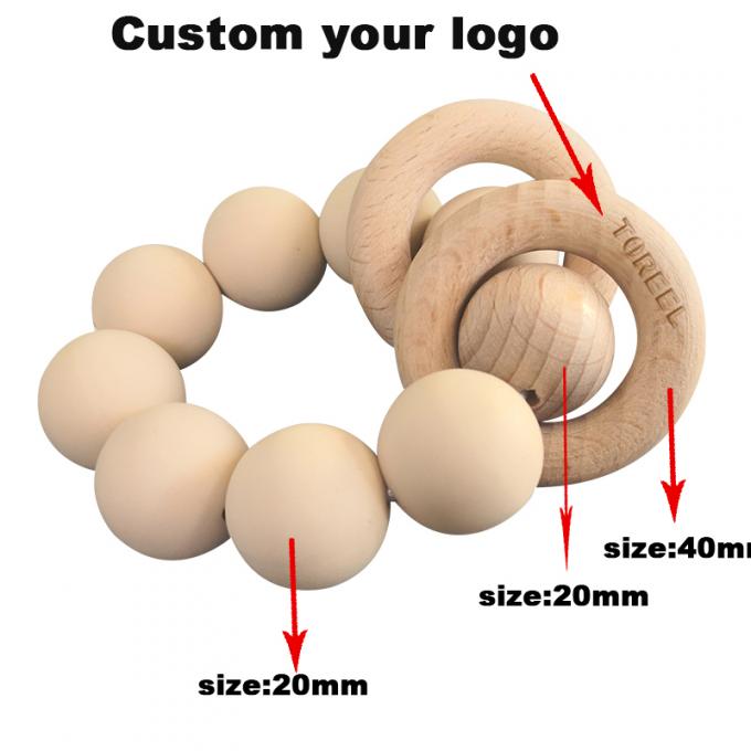 Teether feito sob encomenda do bebê do silicone dos brinquedos dos grânulos do silicone com o bracelete 2 de madeira