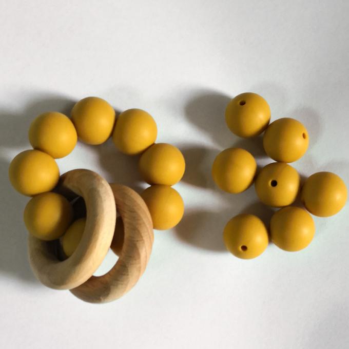15mm a Dinamarca por atacado aprovou grânulos do silicone do teether do bebê para colares
