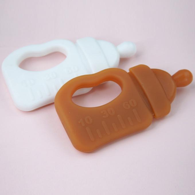 Os dentes novos feitos sob encomenda da garrafa do projeto mastigam o brinquedo livre de Teether do bebê do silicone BPA da vara com caixa