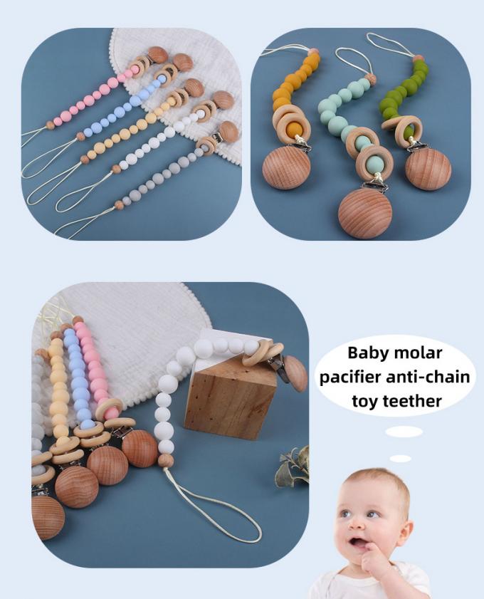Prevenção de madeira da corrente da chupeta do bebê do manequim do grânulo do silicone Eco-amigável por atacado do bebê com anel de madeira